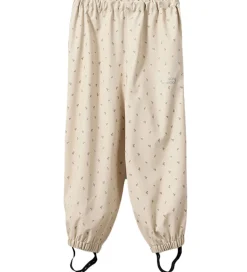 Sofie Schnoor Regntøj - PU - Varask - Sand m. Blomster