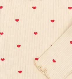 The New Siblings Body l/æ - TnsbRhea - Rib - Gardenia AOP