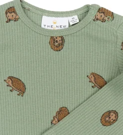 The New Siblings Body l/æ - Rib - TnsbRiver - Lily Pad AOP